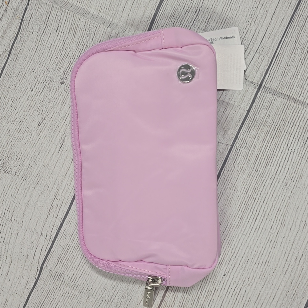NWT Lululemon Everywhere Wordmark Crossbody Belt Bag 1L - Pink/White - Picture 3 of 5